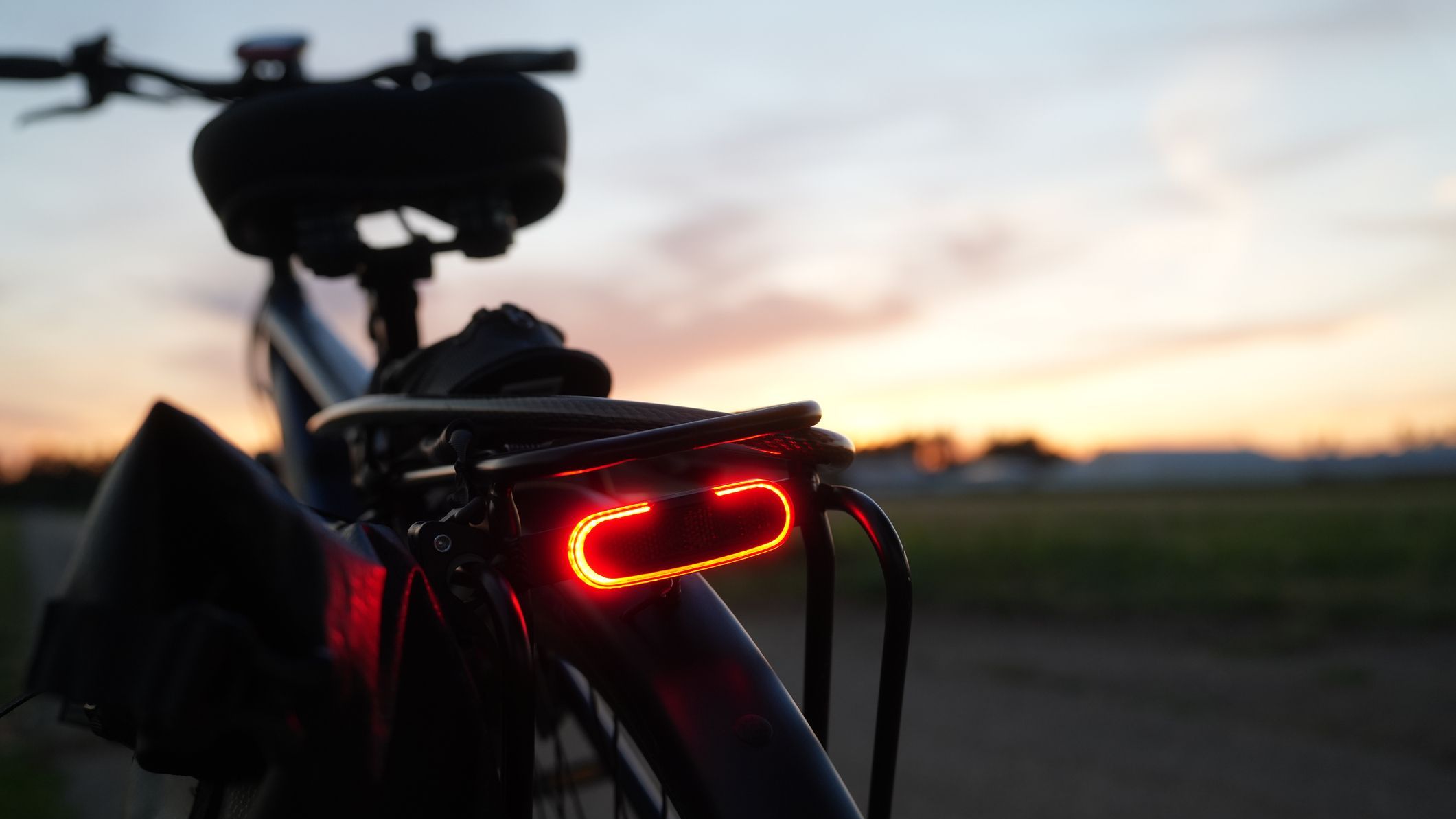 Electric Bicycle Rear Light at Sunset with Copy Space