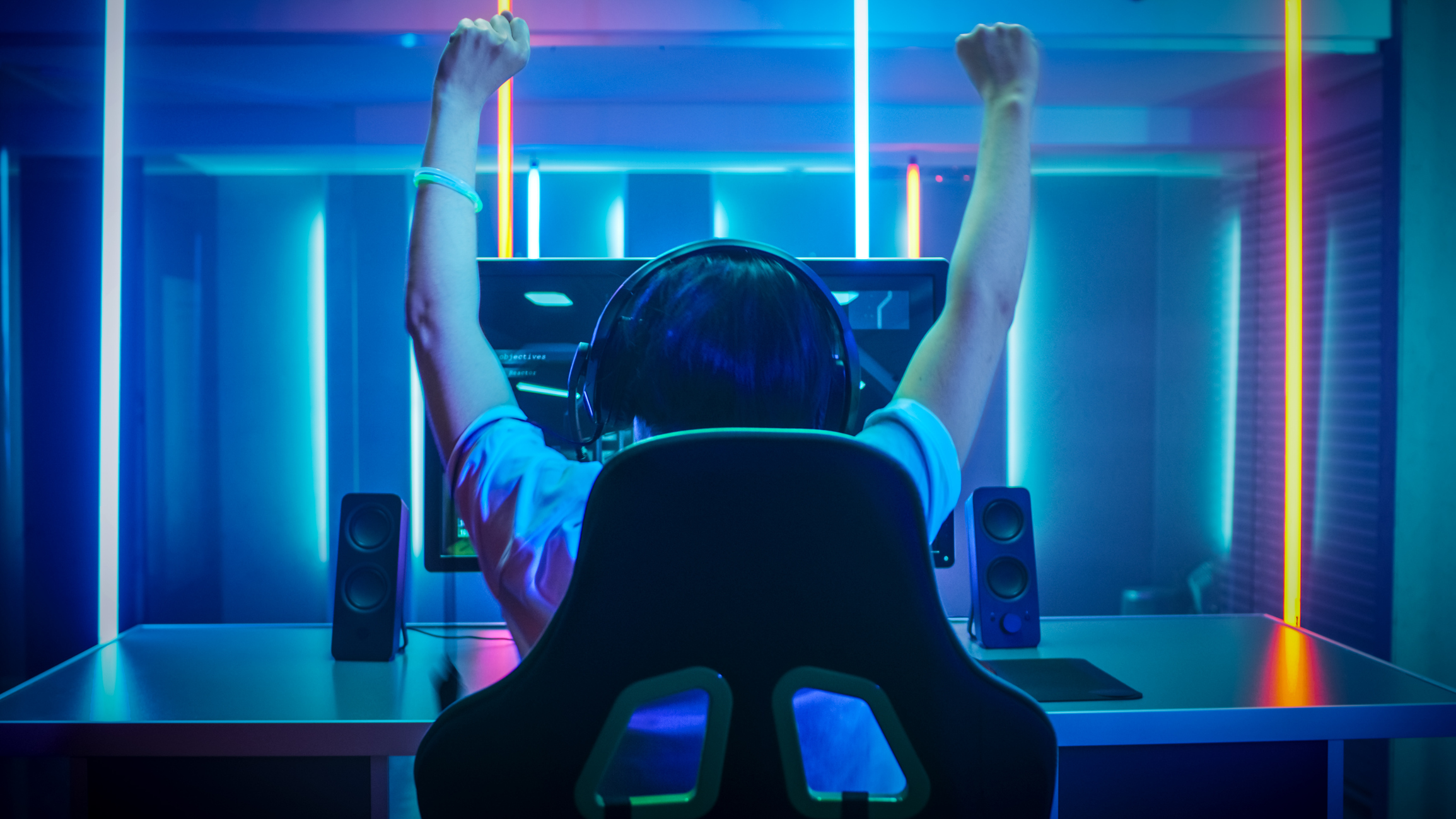 Professional Gamer Playing and Winning in First-Person Shooter Online Video Game on His Personal Computer