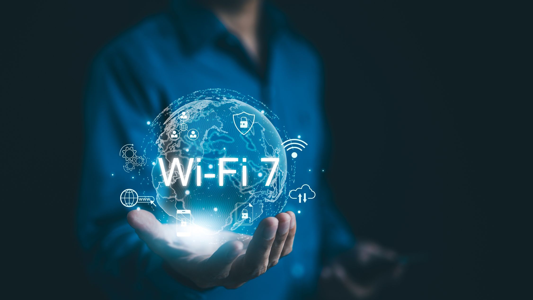 Global Wi-Fi Connectivity and Internet Technology Concept. A person holding a holographic globe highlighting Wi-Fi 7 connectivity