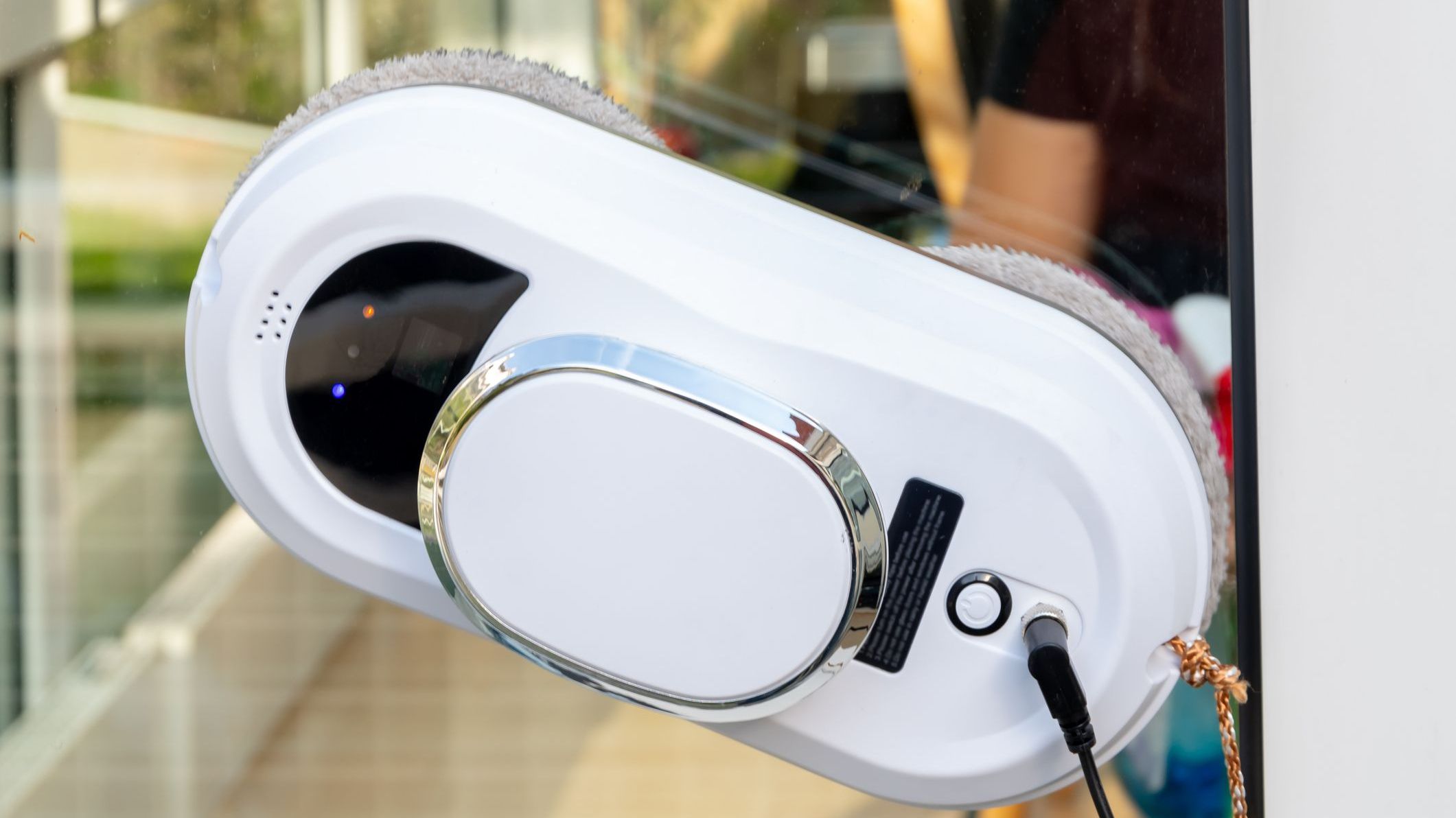 The powered window cleaning robot works on the outside of the window