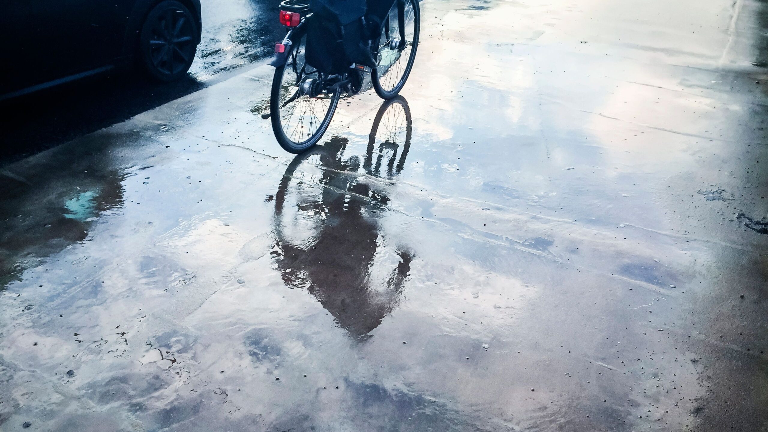 Wet Street with bycicle reflection