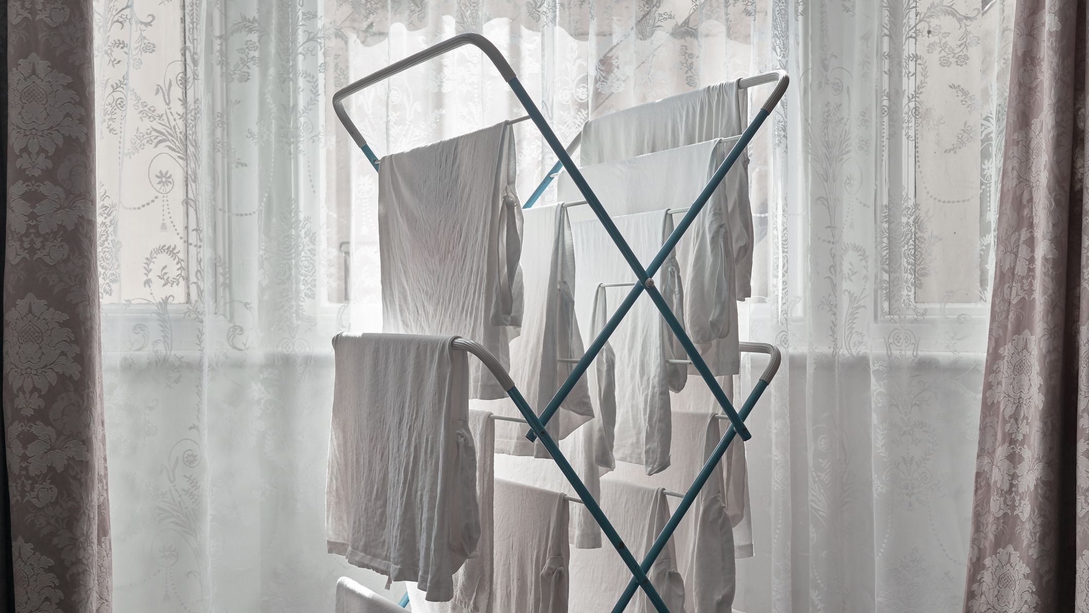 White Laundry Hangs on a Clothes Airer