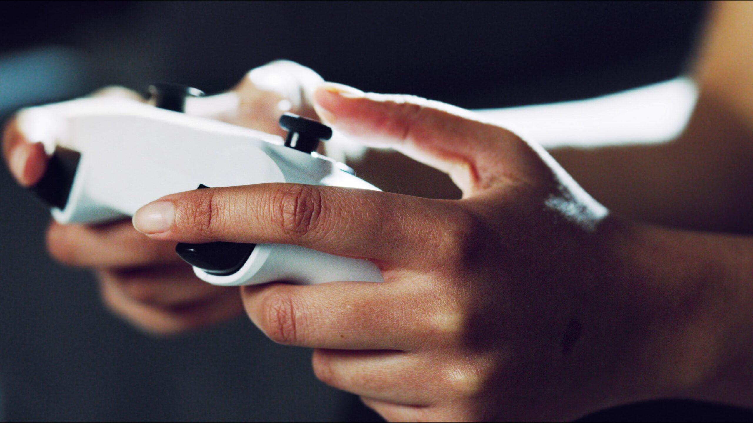 Hands, closeup and video game controller in home for esports challenge, click and strategy for next level.